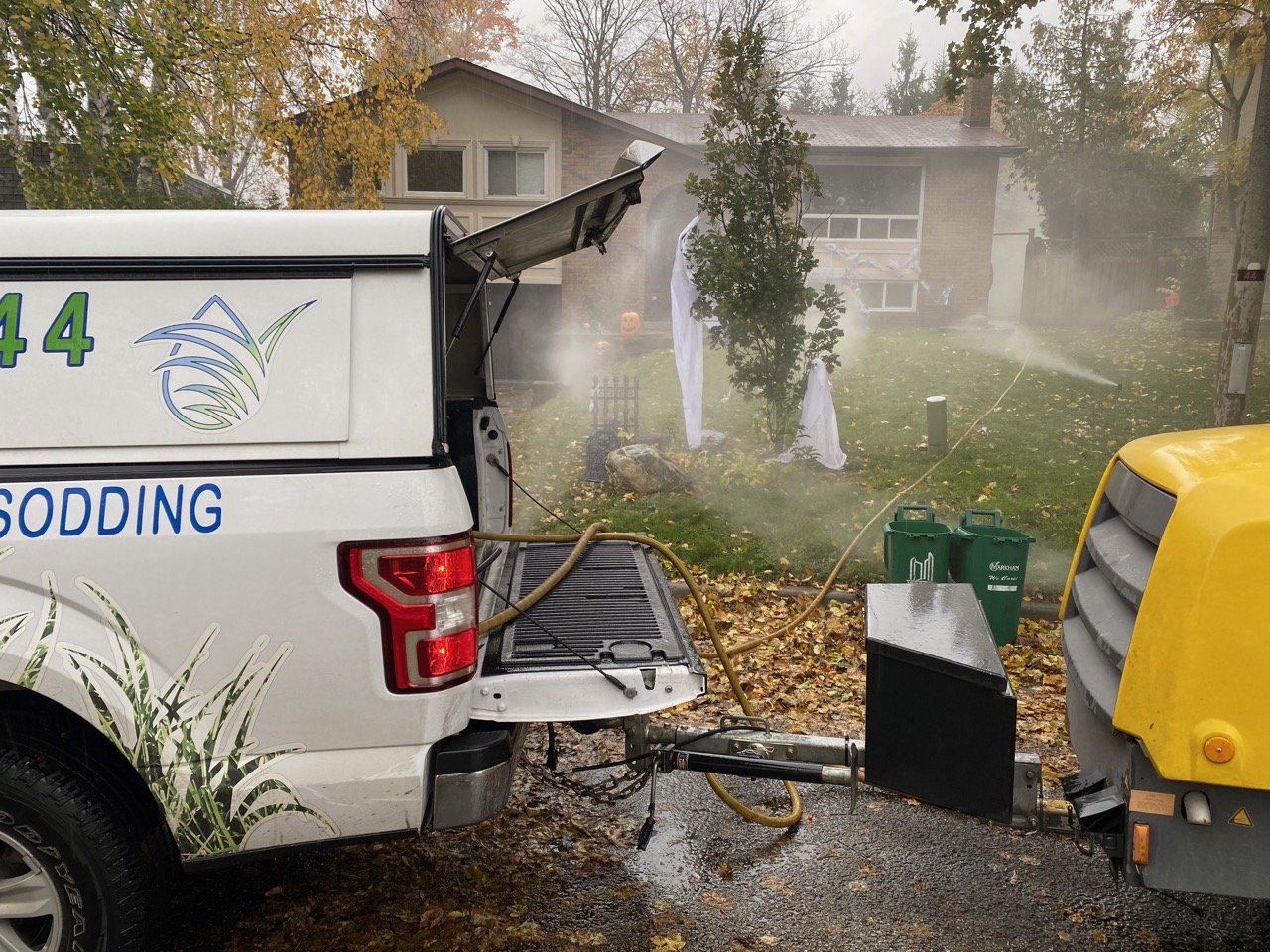 The Sprinkler Company service truck and compressor during fall sprinkler winterization