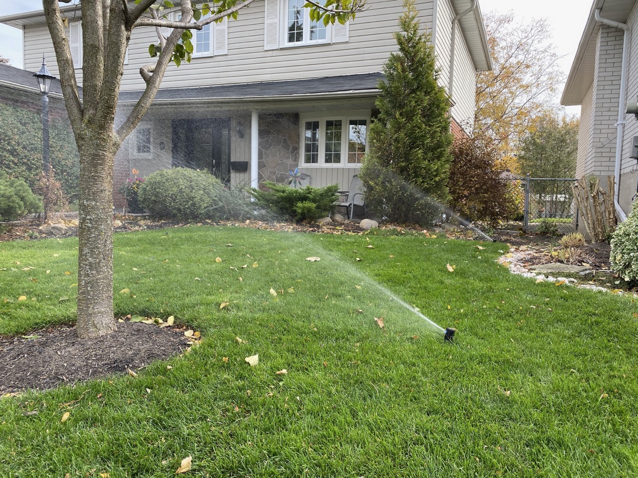 Several sprinklers discharging during a residential closing
