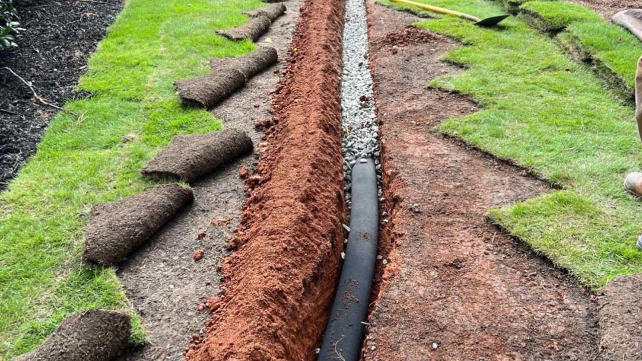 clogged French drain symptoms Inspect outlet, slope, cleanouts, and fabric failure. Toronto drainage